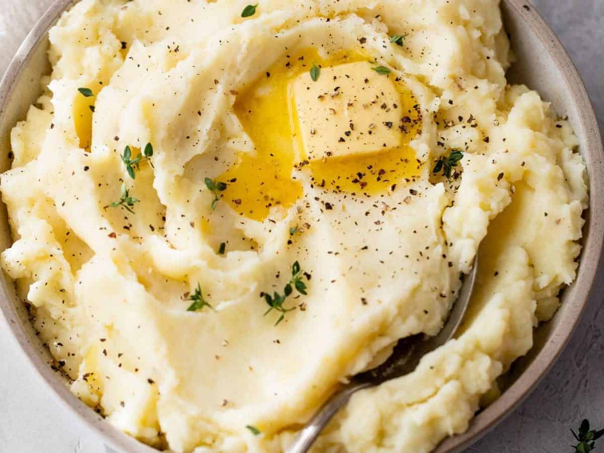 Overhead view of garlic mashed potatoes in bowl