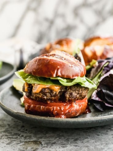Air Fryer Hamburger with Cheese and Toppings on a Bun
