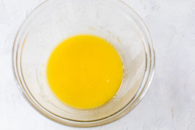 butter in a bowl for making easy oatmeal cookies