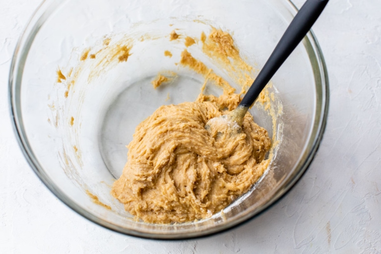 mixing ingredients in a bowl for simple oatmeal cookies