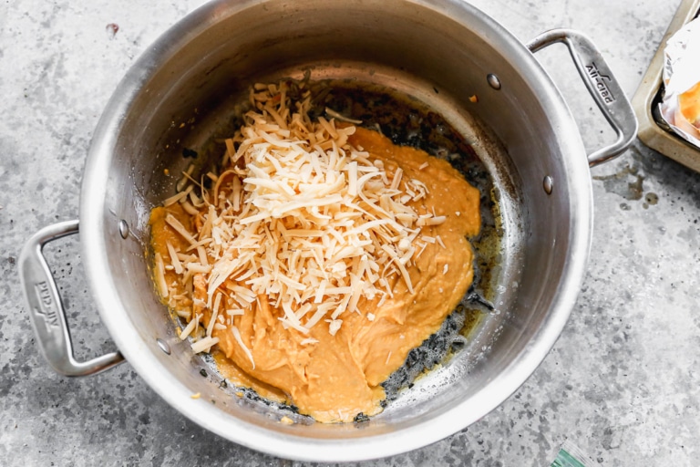 cheese and creamy butternut squash pasta sauce in large pot