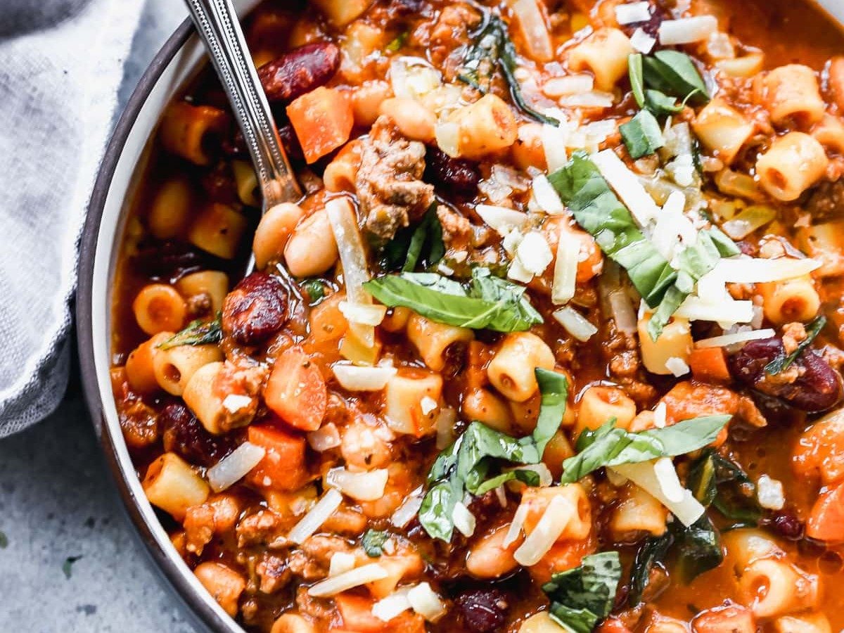 the BEST pasta fagioli recipe in a bowl with a spoon