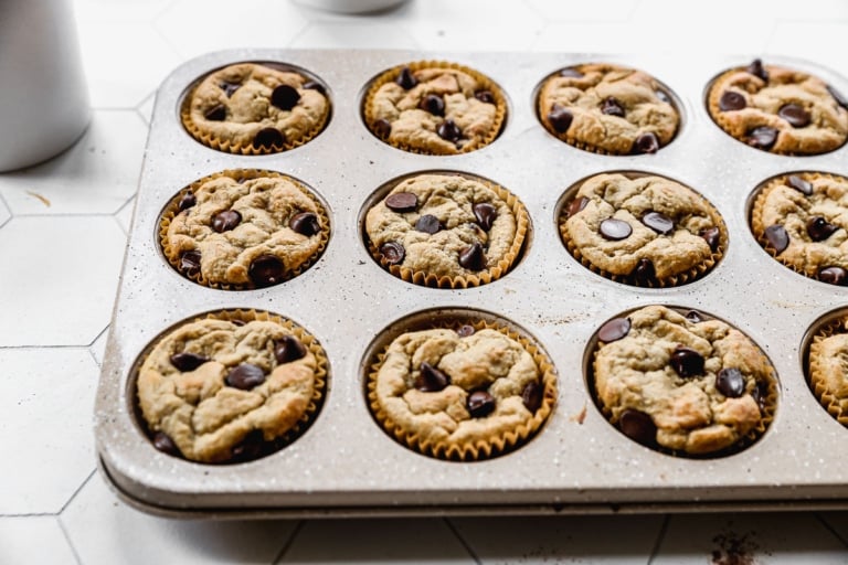 baked banana oatmeal muffins in a muffin tin