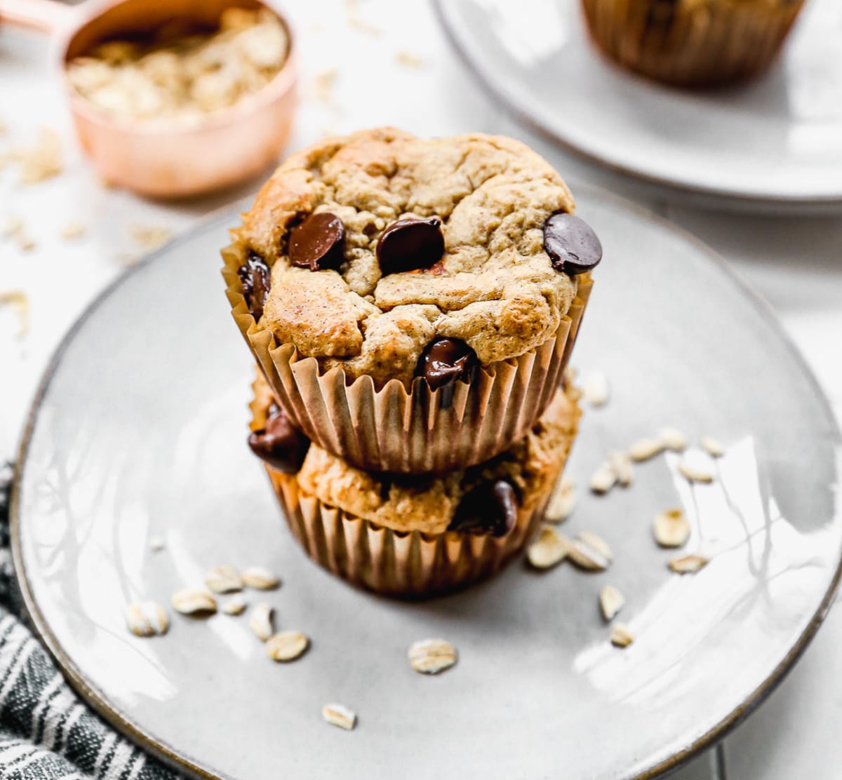 healthy banana oat muffins in a stack