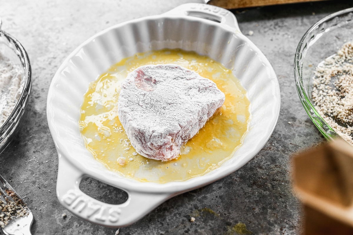 dredging pork chops in egg