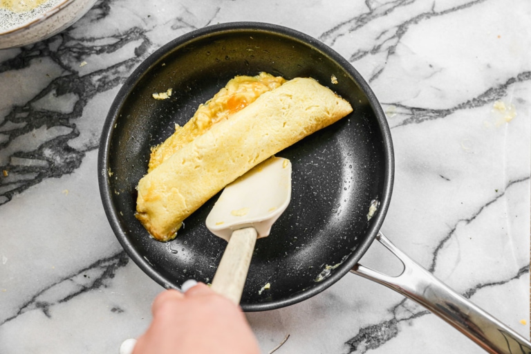 a perfect french omelette on a pan