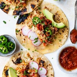 shredded chicken tacos with toppings