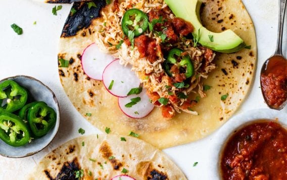 shredded chicken tacos with toppings