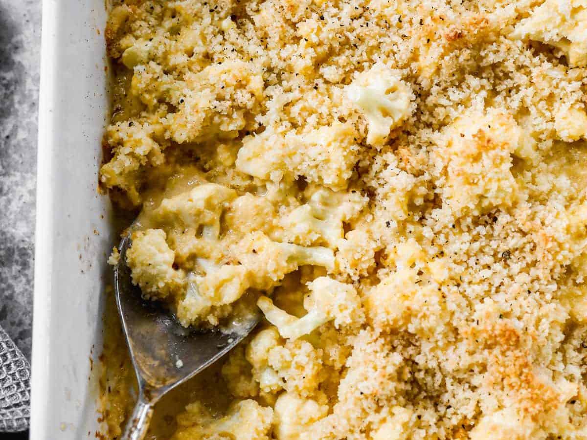 a pan of cheesy cauliflower "mac" and cheese