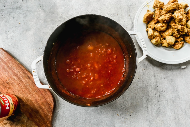 simmering ingredients for stovetop Indian butter chicken