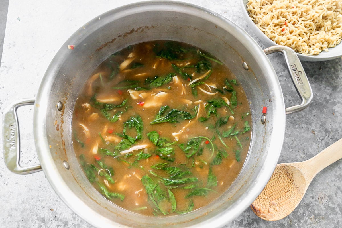 simmering miso ramen in a large pot