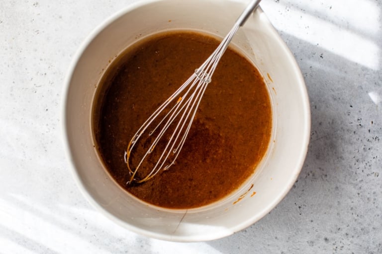 whisking wet ingredients for pumpkin oatmeal cookies recipe