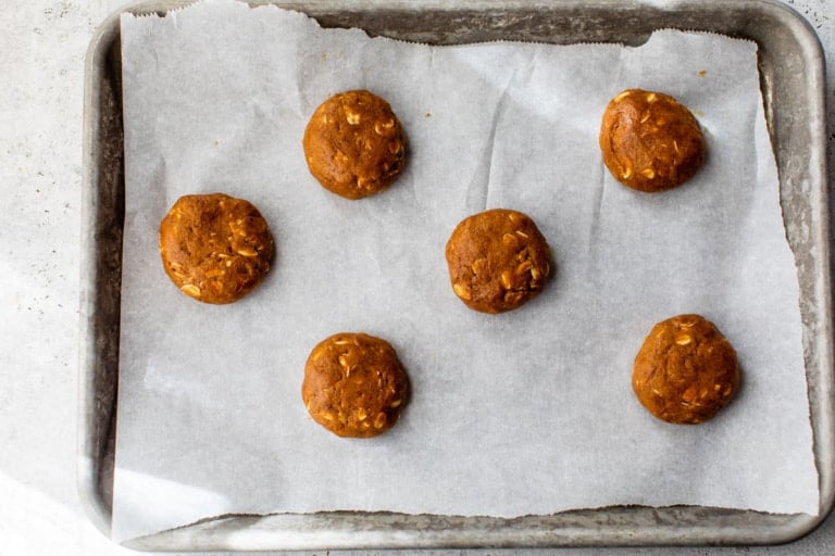 baked pumpkin oatmeal cookies on a cookie sheet