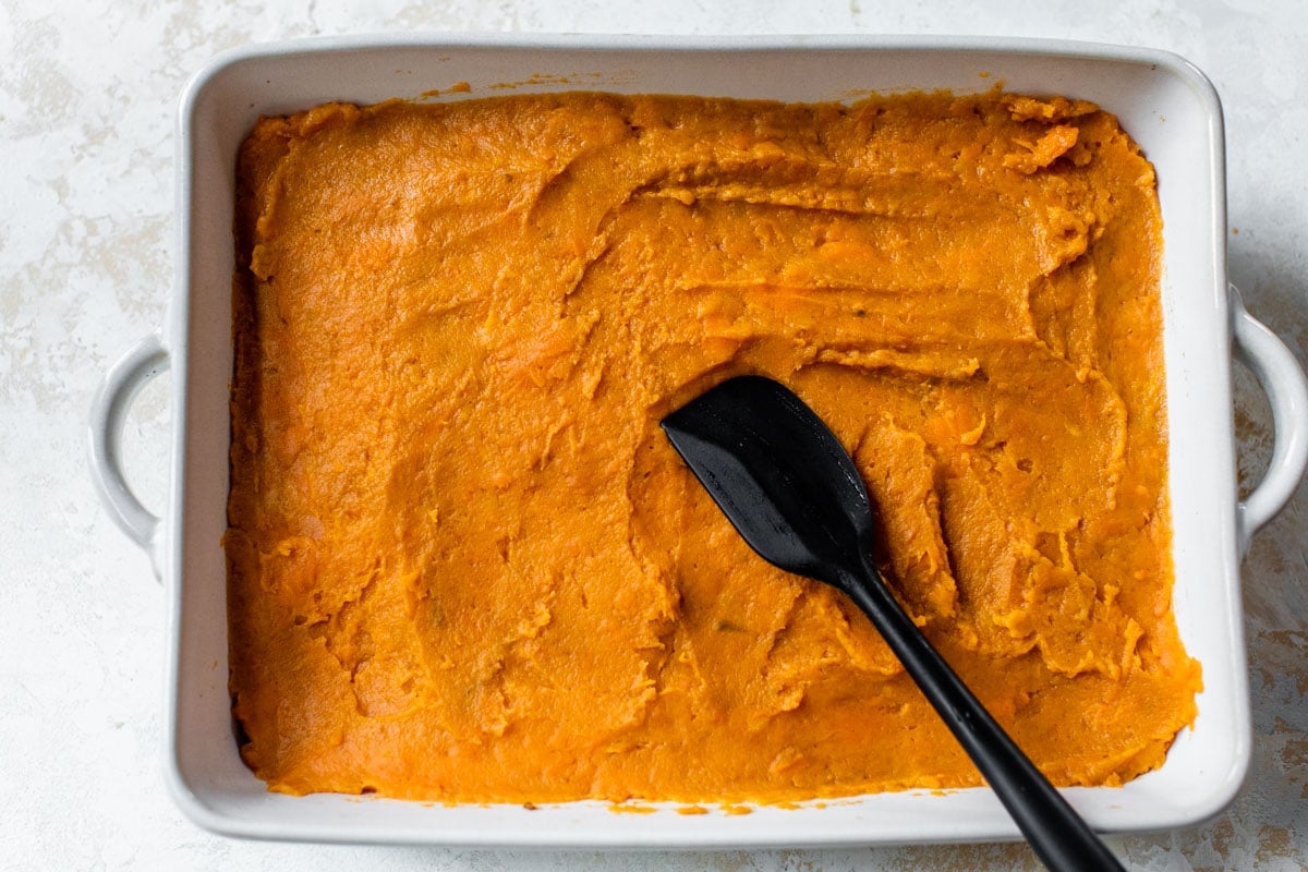 classic sweet potato casserole in a baking dish
