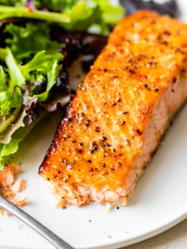 a plate with crispy air fryer salmon