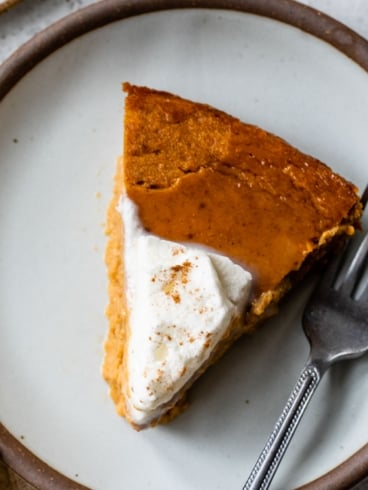 a slice of the best easy crustless pumpkin pie