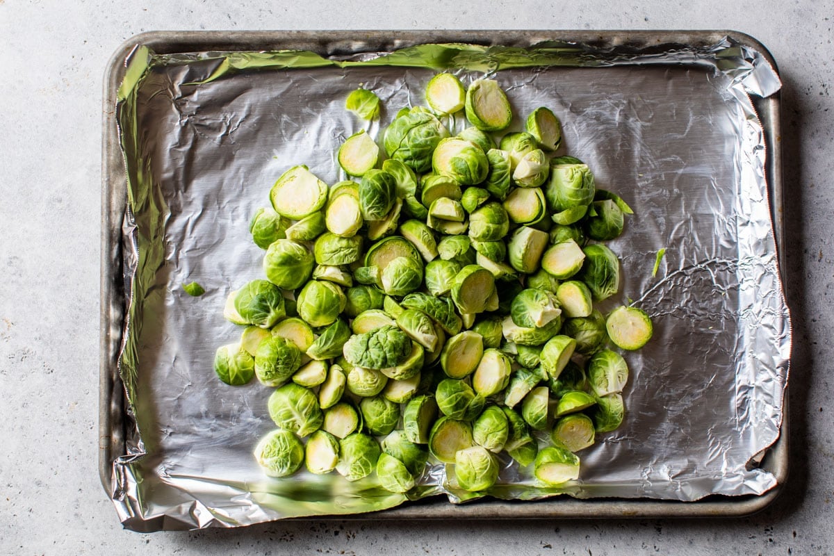 chopped brussels sprouts on a baking sheet