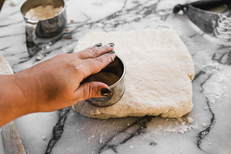 biscuit cutter cutting perfect round bicuits for breakfast