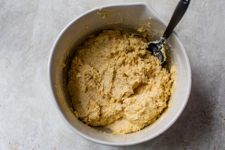 mixed ingredients in mixing bowl for skillet cornbread recipe