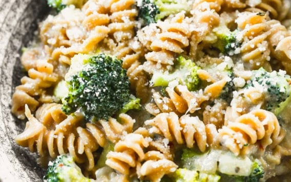 Bowl of creamy broccoli pasta with parmesan