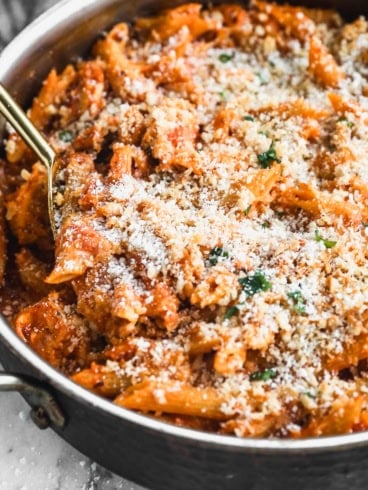 a pan of cheesy chicken parmesan pasta