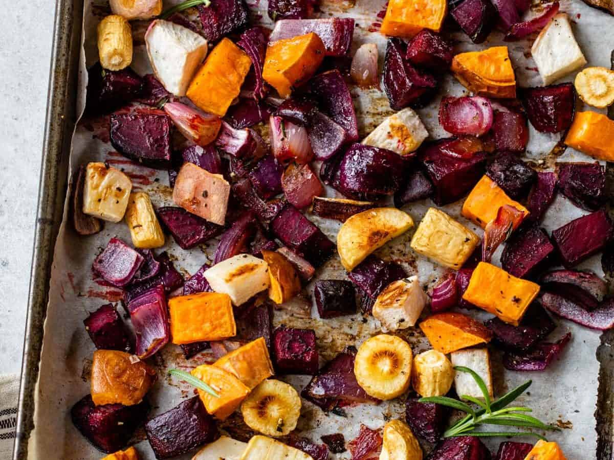 crispy roasted root vegetables on a sheet pan