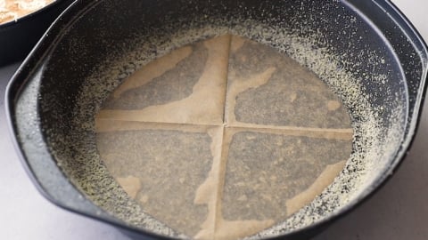 Preparing pan for gluten-free carrot cake recipe