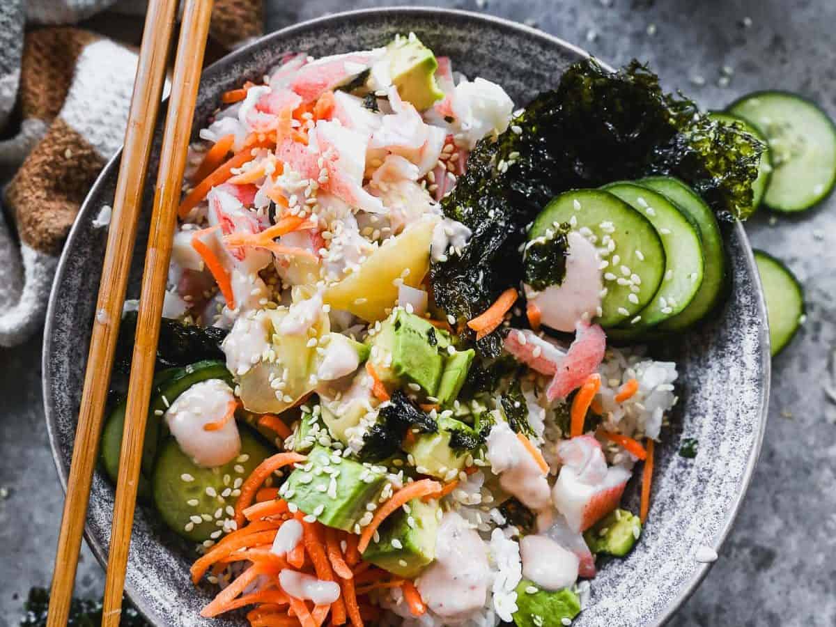 crab sushi bowl with chopsticks