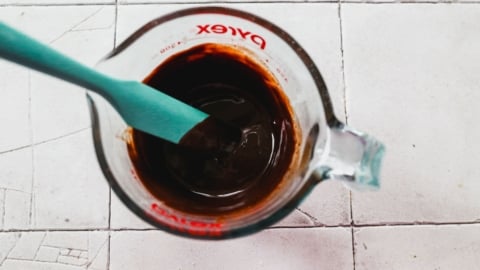 Melted chocolate and butter in liquid measuring cup