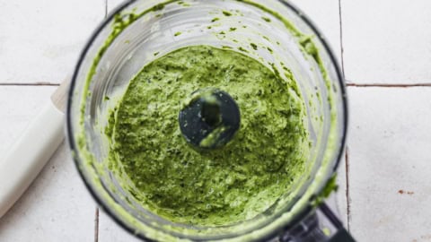 Creamy pesto in food processor bowl