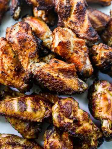 Overhead view of smoked chicken wings on platter