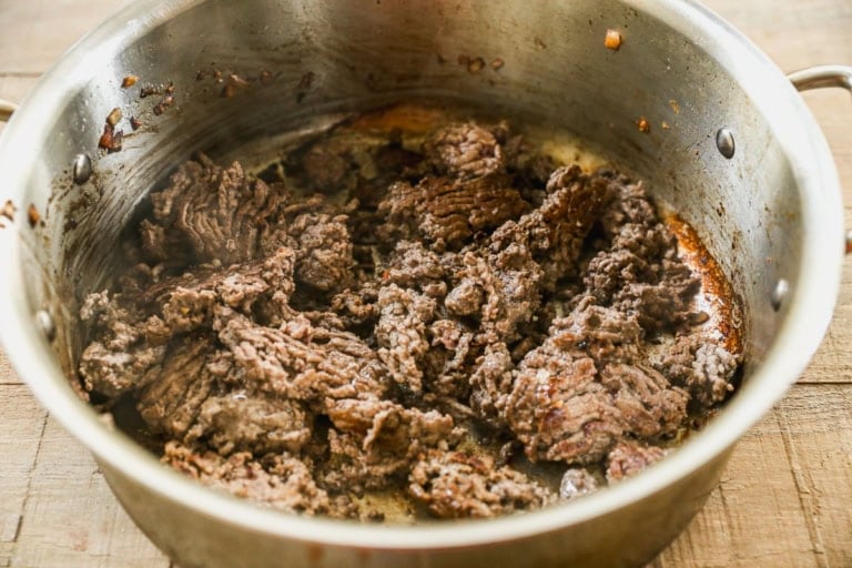 Ground beef cooking in pot