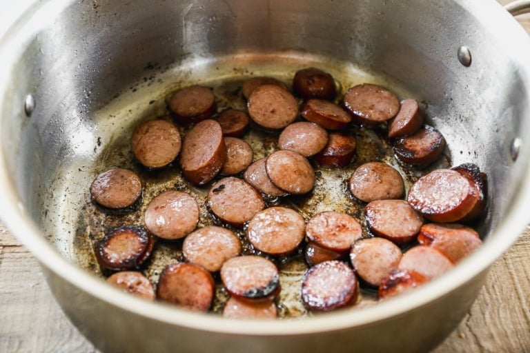 Kielbasa cooking in pot