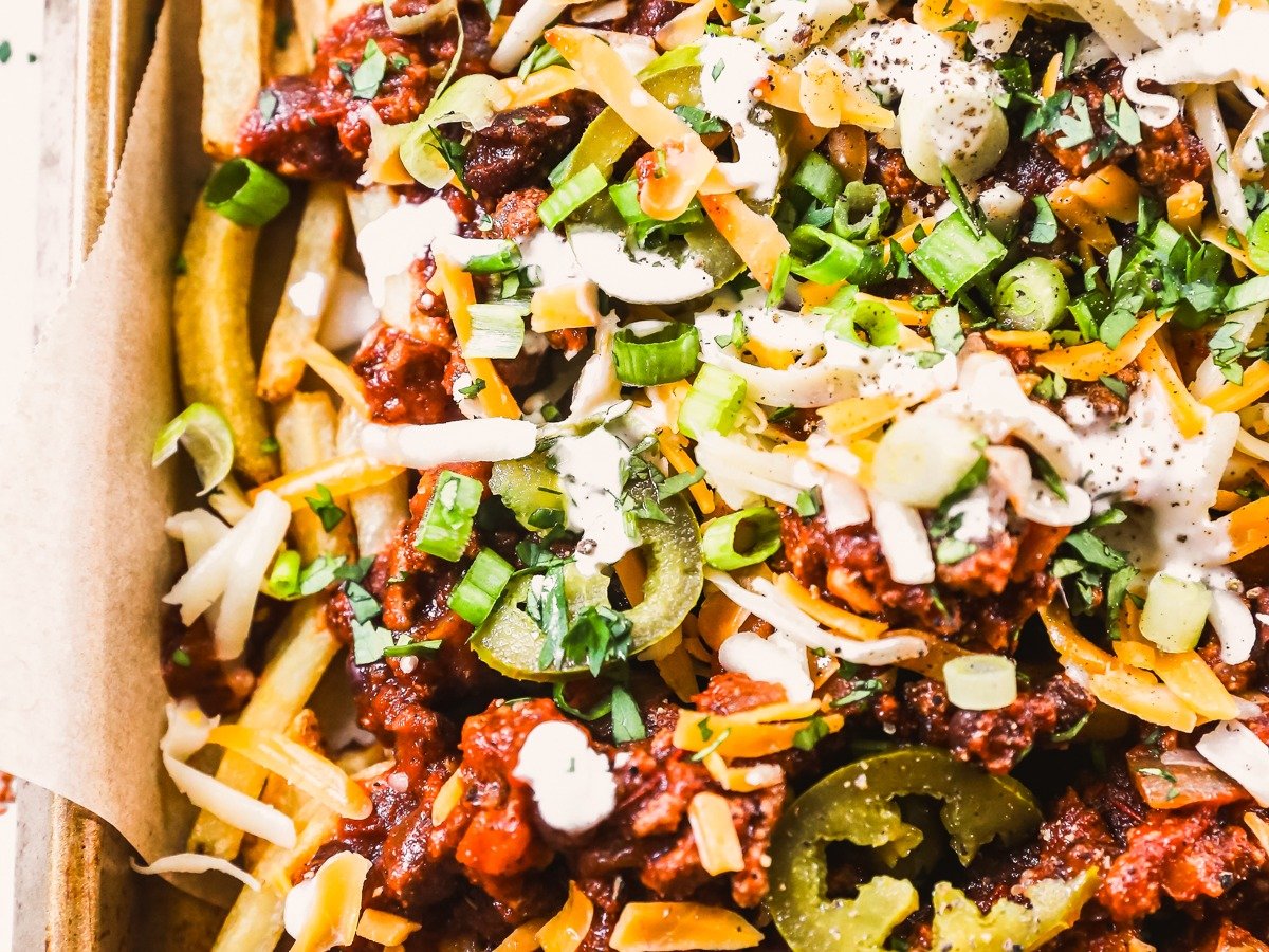 Homemade chili cheese fries on pan