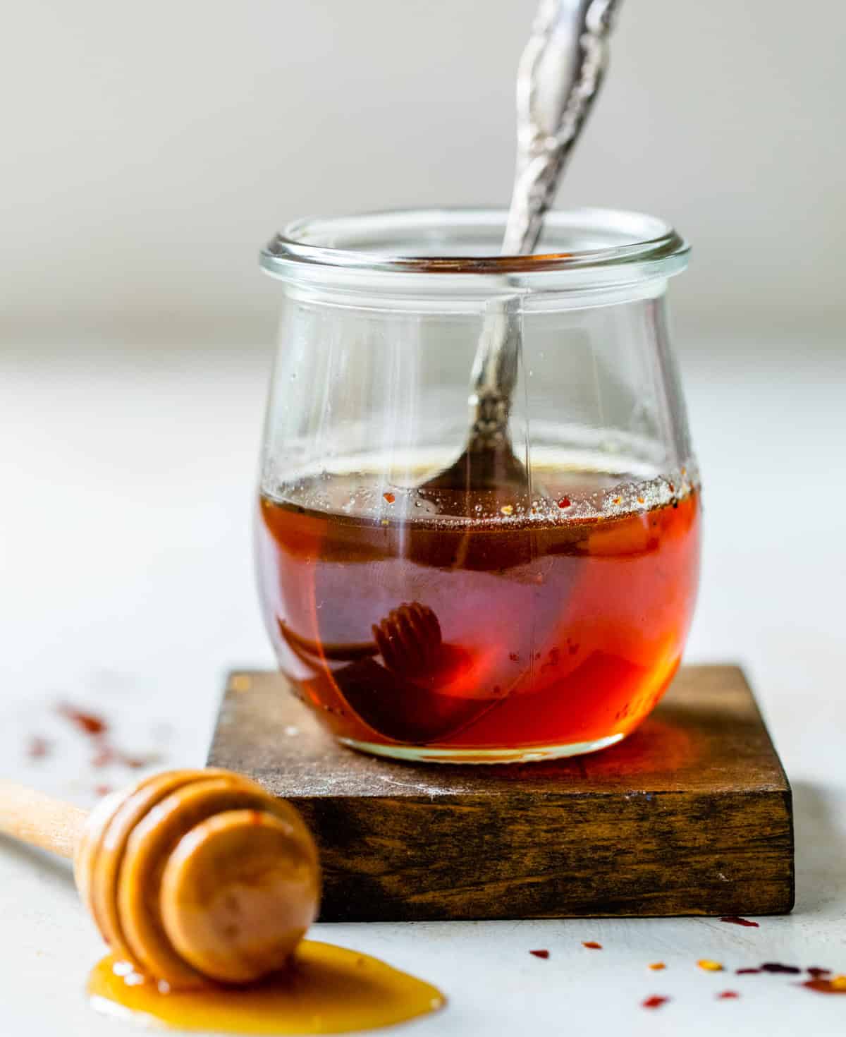Jar of hot honey recipe with spoon