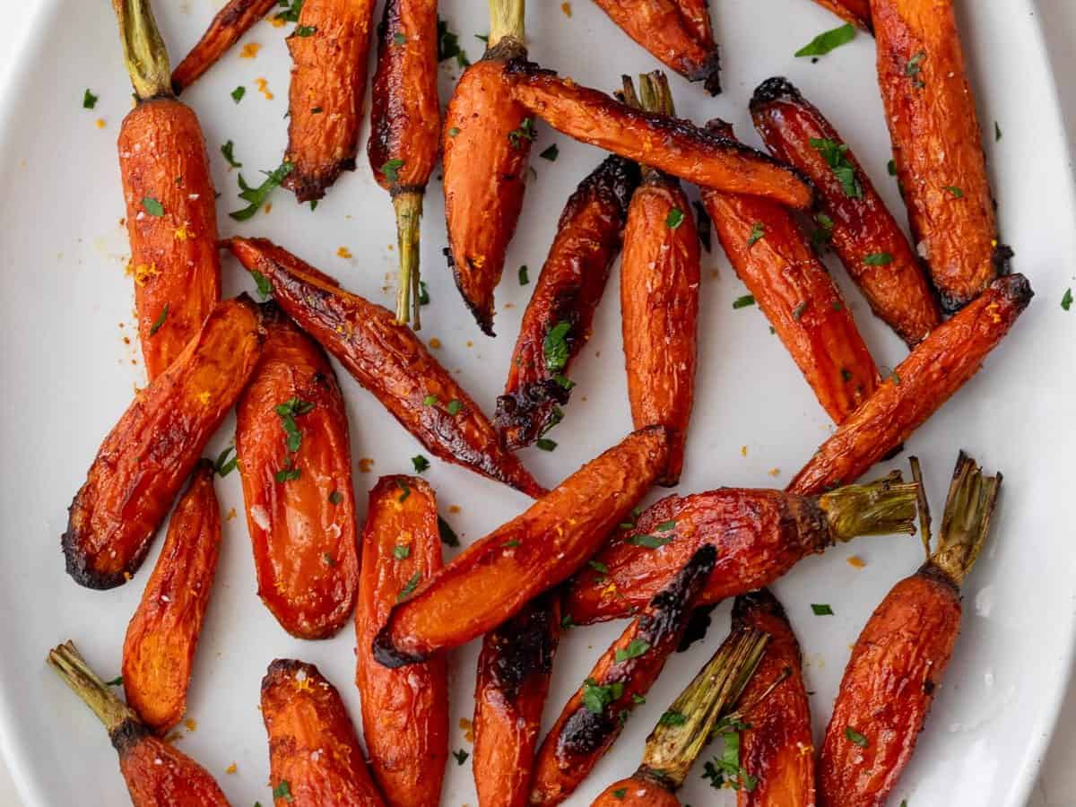 Overhead view of honey glazed carrots on platter