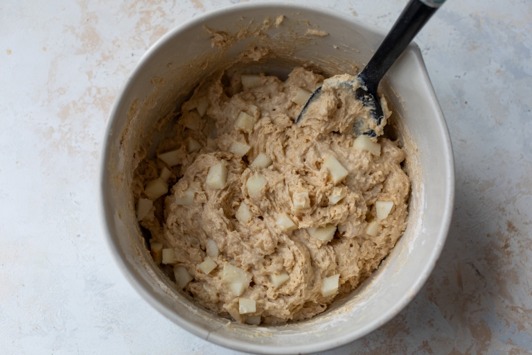 Pear cake batter in mixing bowl