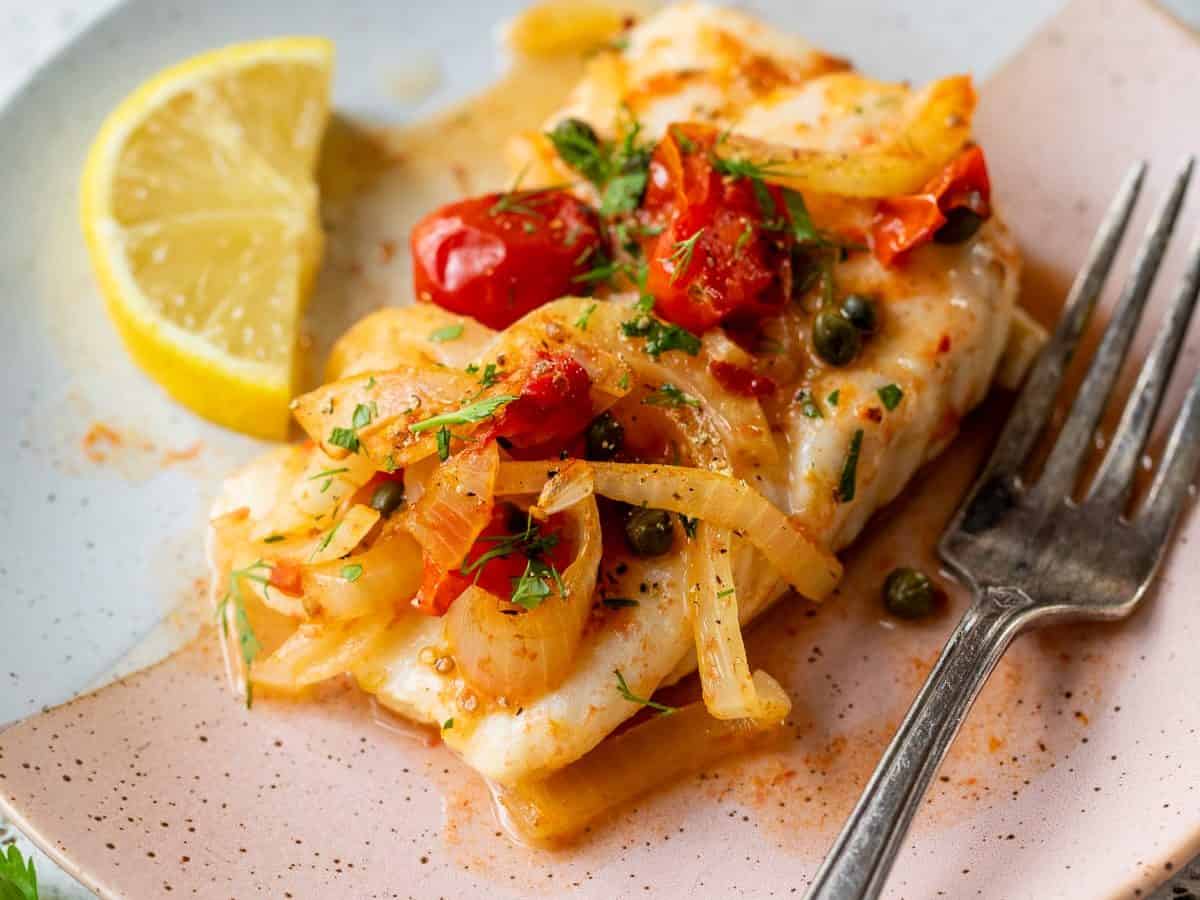 Baked cod on plate