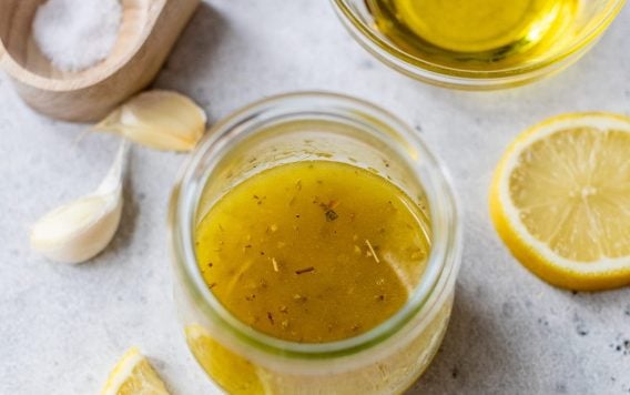 Top-down view of lemon vinaigrette in jar