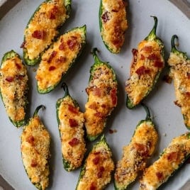 Overhead view of air fryer jalapeño poppers on plate