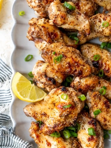 Crispy lemon pepper wings on platter