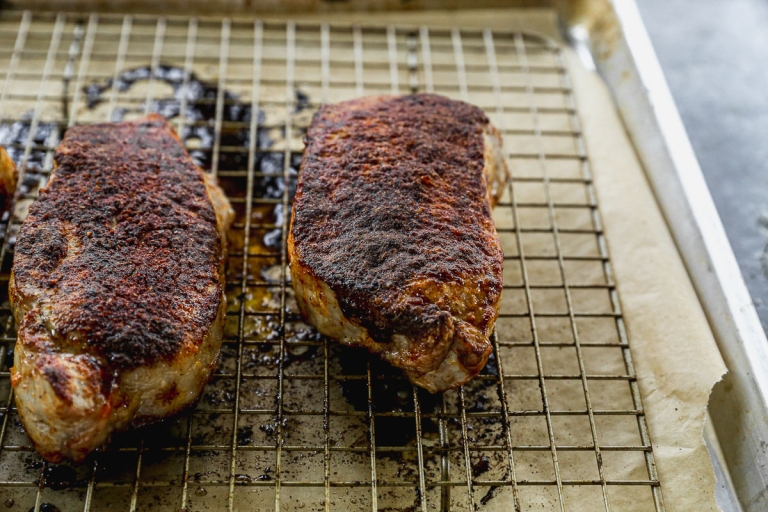 Baked pork chops on wire rack