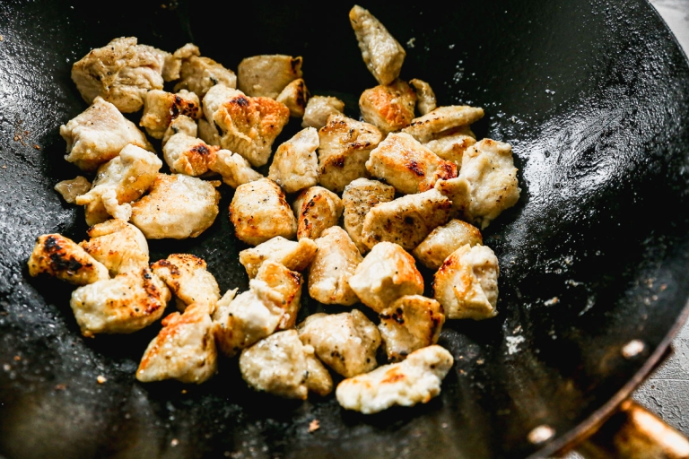 Chicken cooking in wok