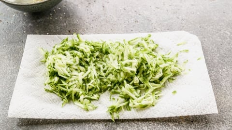 Grated cucumber on paper towels