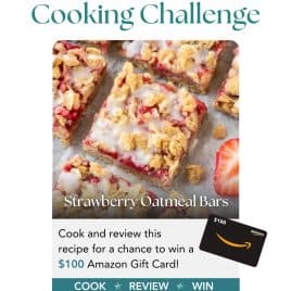 Overhead view of strawberry oatmeal bars with icing, promoting a May cooking challenge to win a $100 Amazon gift card.