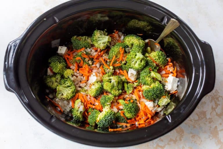 Ingredients for broccoli cheese soup in slow cooker.