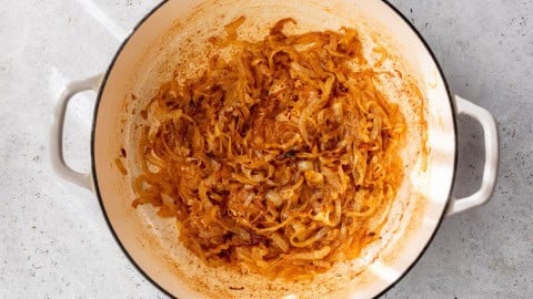 Onions caramelizing in Dutch oven.