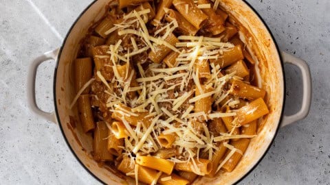 Cheese added to French Onion Pasta in Dutch oven.