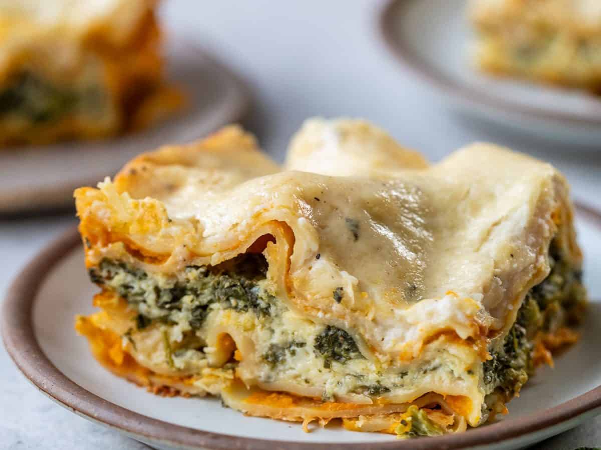 Slice of butternut squash lasagna on plate.
