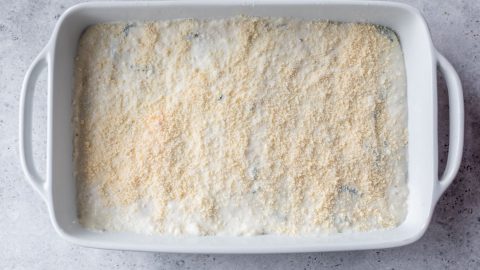 Butternut squash lasagna in pan before baking.